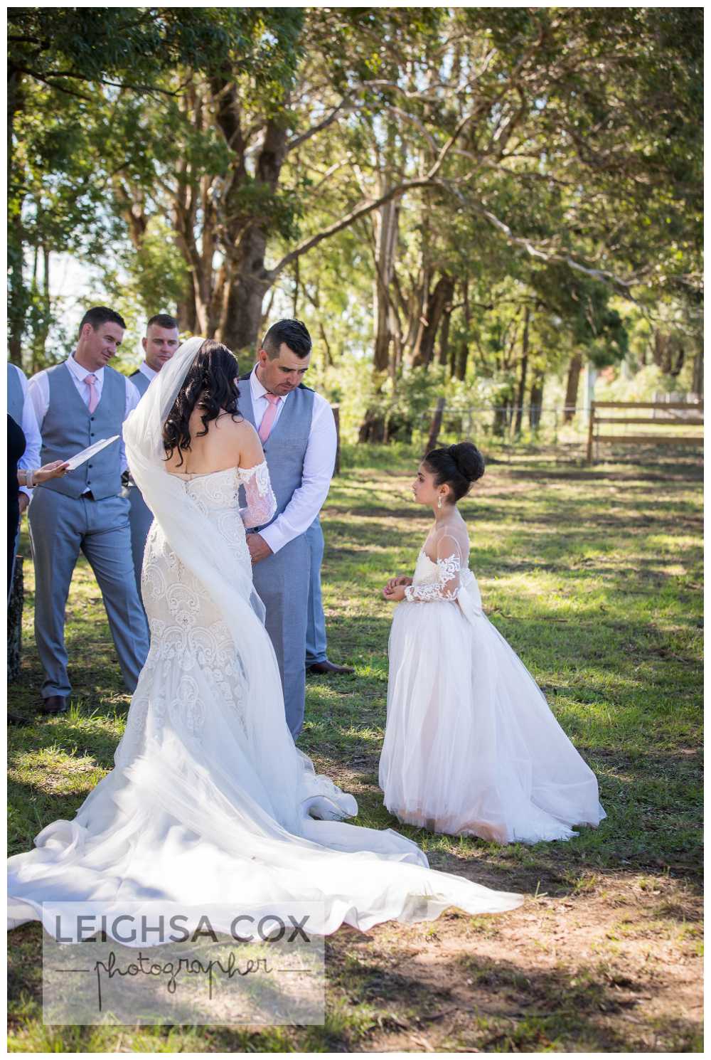 flower girl delivers the rings