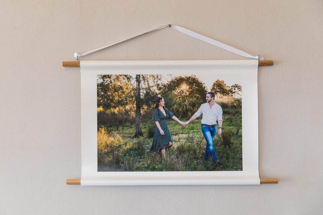Beautiful canvas print. Bride and groom holding hands. Photographed by Newcastle and Hunter region wedding photographer.
