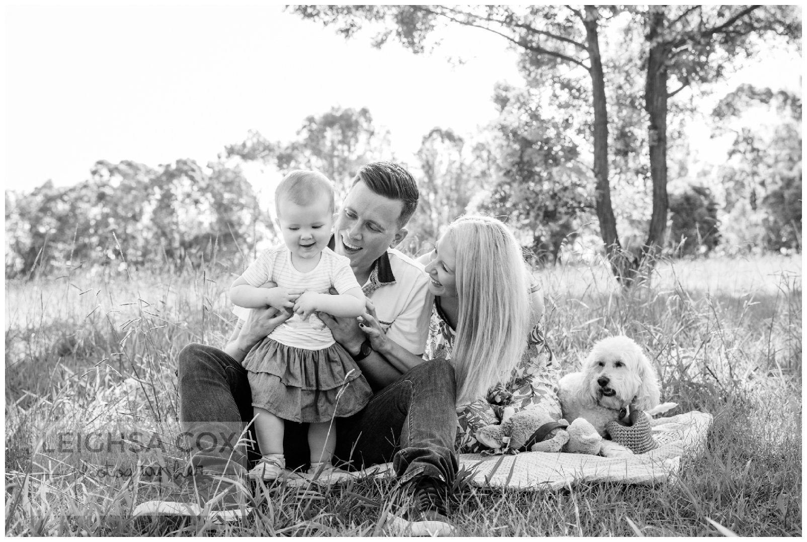 black and white family in park