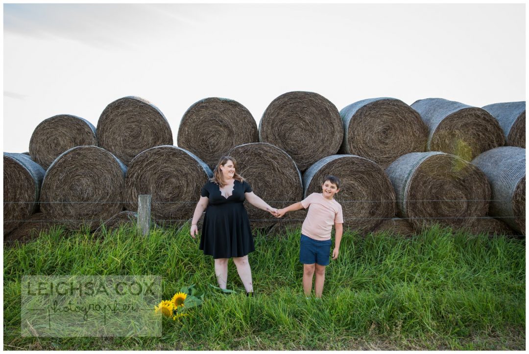 hay bales and sunflowers