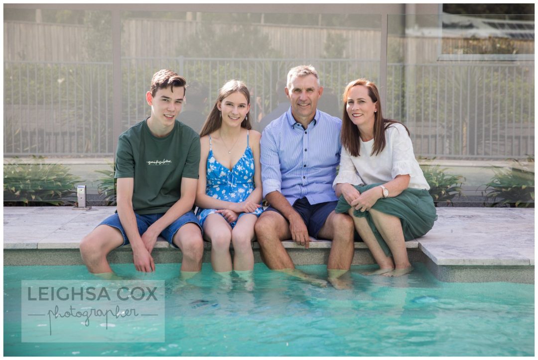 family by the pool